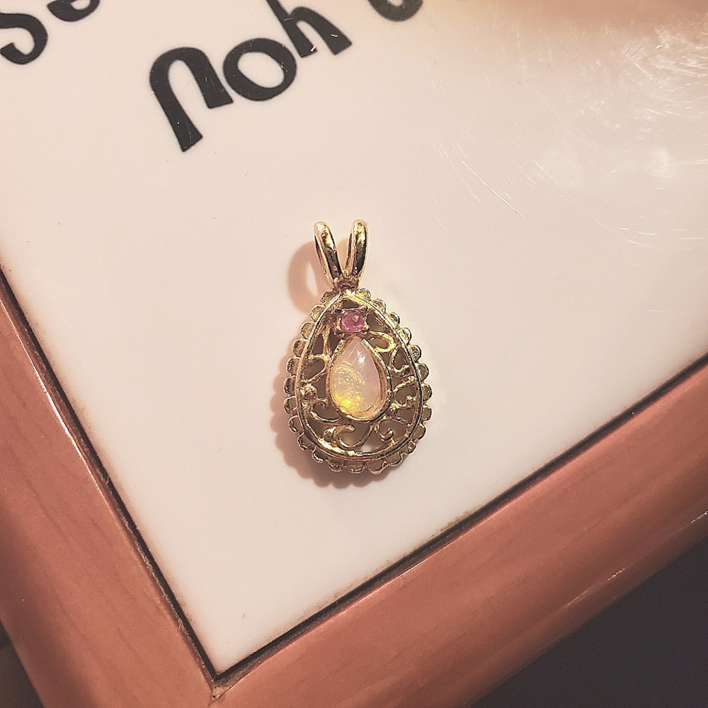 Gold, ruby and opal pendant